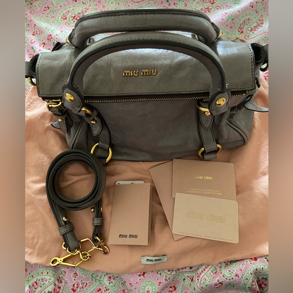 Miu Miu Vitello Lux bow bag. Authentic with dust bag and certificate.